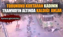 Torununu kurtaran kadının tramvayın altında kaldığı  anlar kamerada