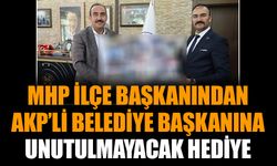MHP ilçe Başkanından AKP’li Belediye Başkanına unutulmayacak hediye