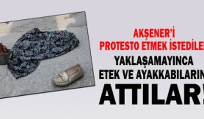 Akşener’i Protesto etmek istediler, yaklaşamayınca etek ve ayakkabılarını attılar