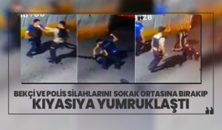 Bekçi ve polis silahlarını sokak ortasına bırakıp kıyasıya yumruklaştı